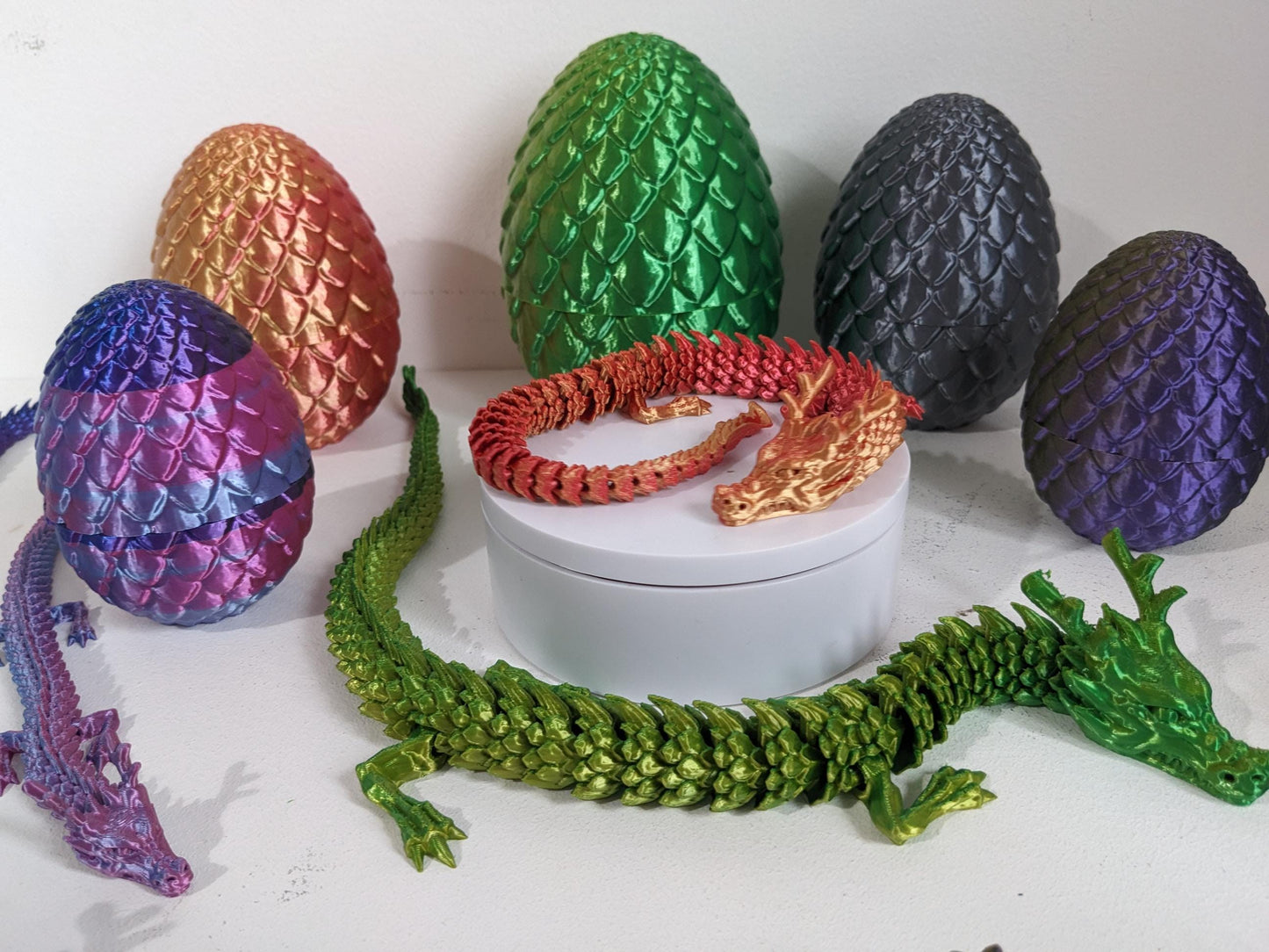 Articulated Crystal slinky Dragon 3d printed horned fidget toy. Three sizes with or without egg. UK made top quality.