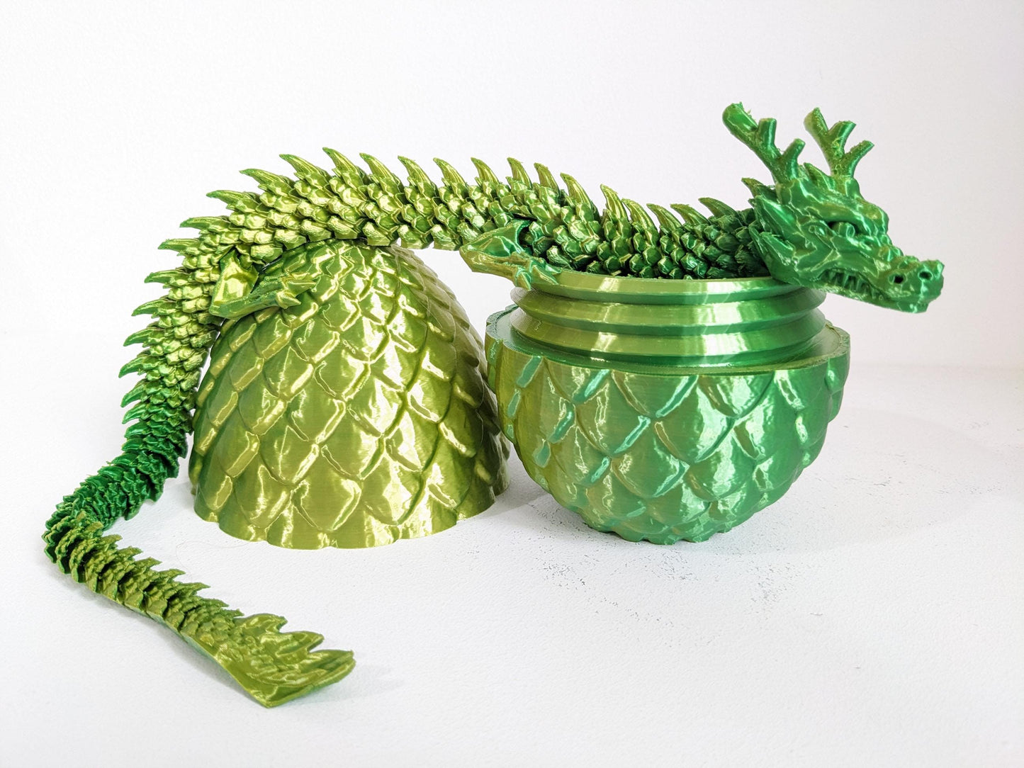 Articulated Crystal slinky Dragon 3d printed horned fidget toy. Three sizes with or without egg. UK made top quality.