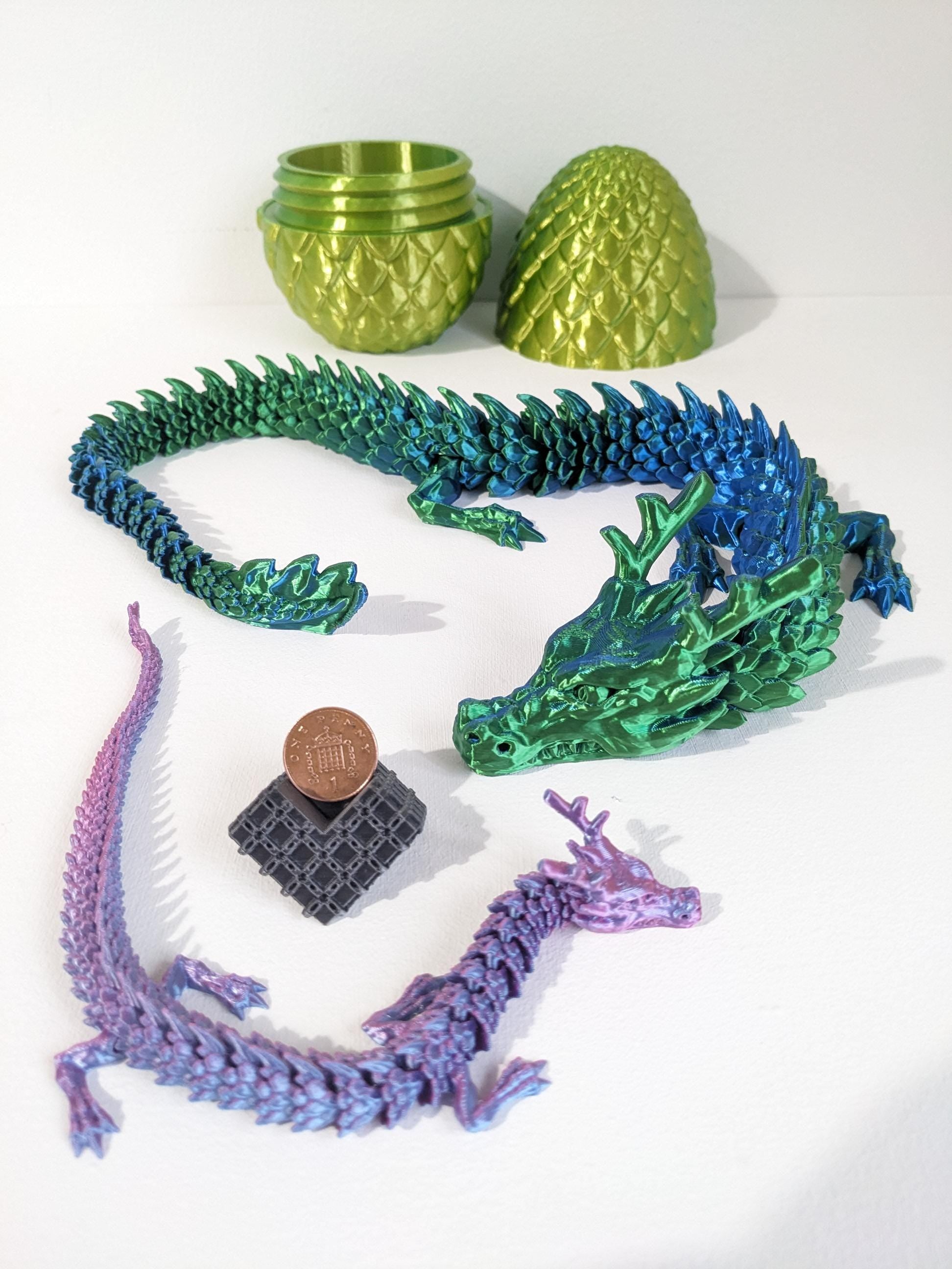 Articulated Crystal slinky Dragon 3d printed horned fidget toy. Three sizes with or without egg. UK made top quality.