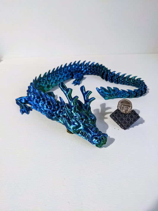 Articulated Crystal slinky Dragon 3d printed horned fidget toy. Three sizes with or without egg. UK made top quality.