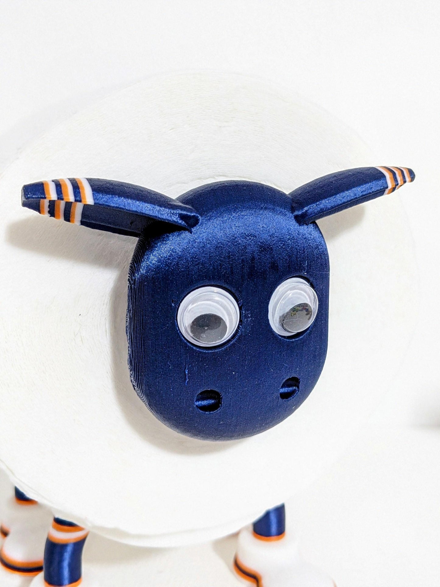 Chicago Bears American football spare toilet roll holder, NFL themed restroom novelty bathroom accessory with personalised player number.