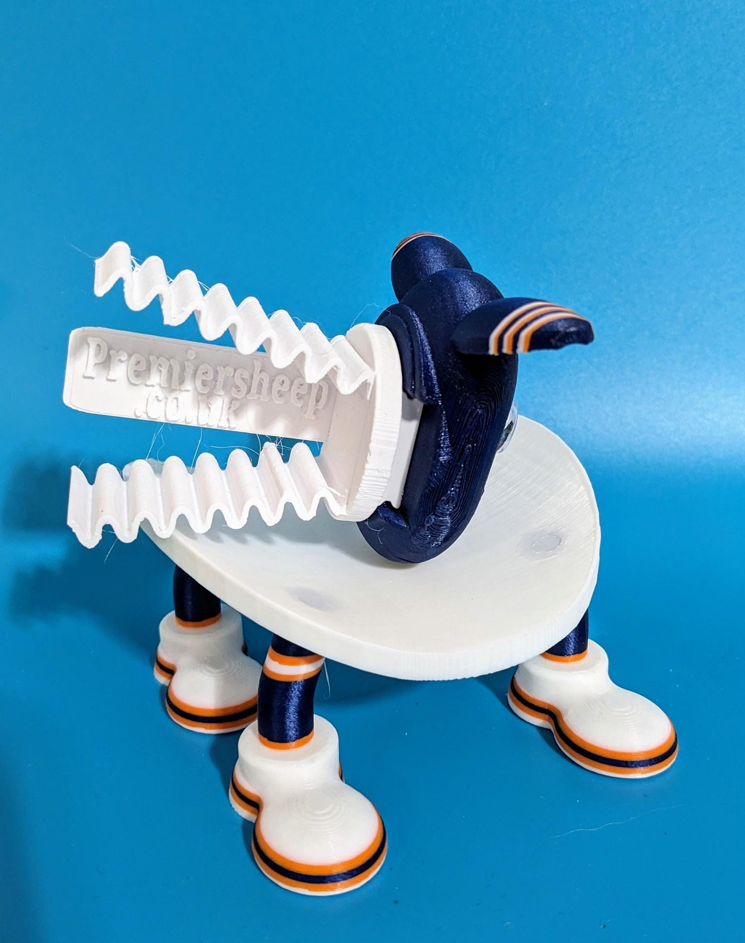 Chicago Bears American football spare toilet roll holder, NFL themed restroom novelty bathroom accessory with personalised player number.