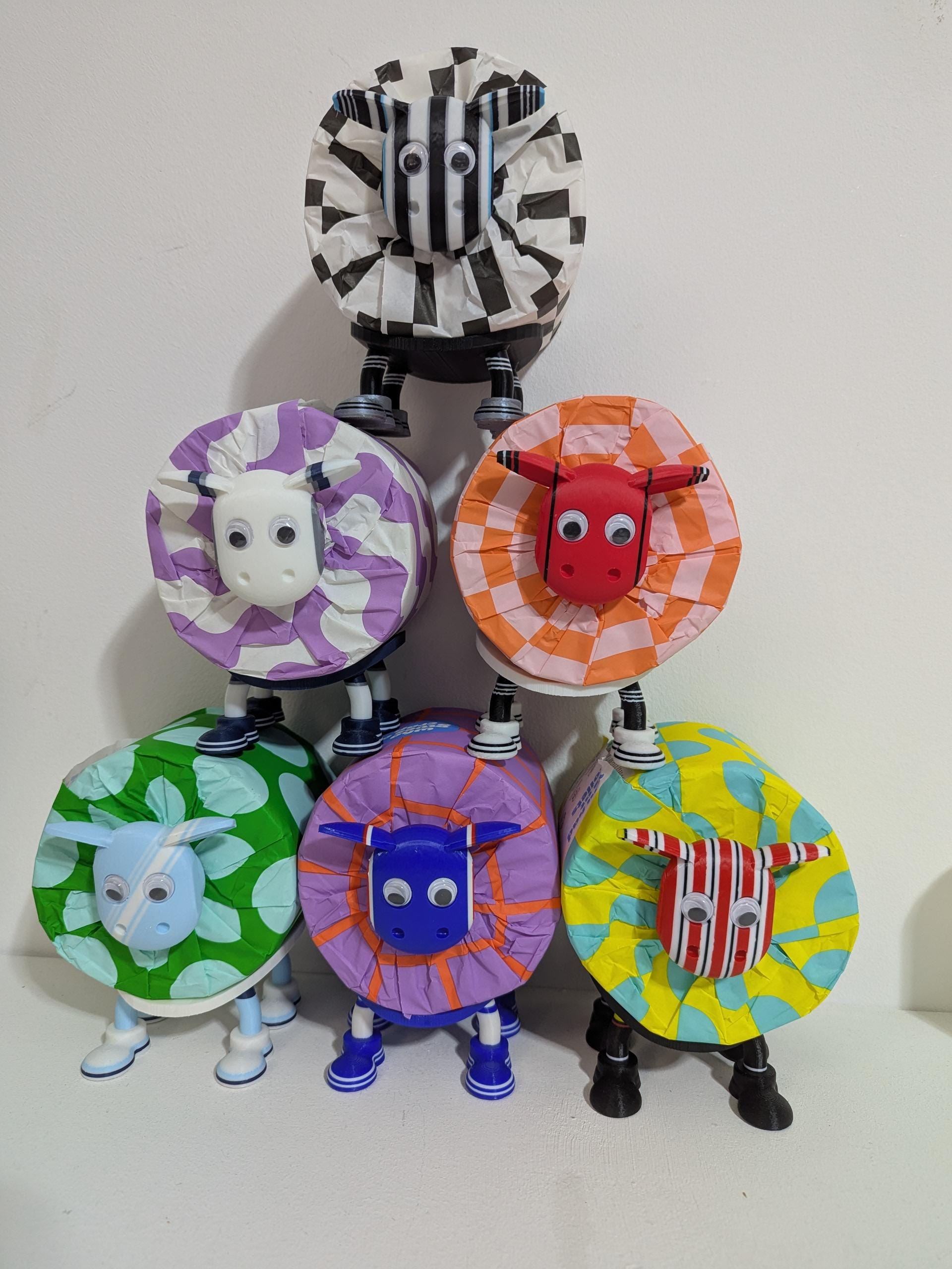 Manchester Utd Premier Sheep 2025 spare toilet roll holder or tissue dispenser cwith customised choice of Man united football boots.