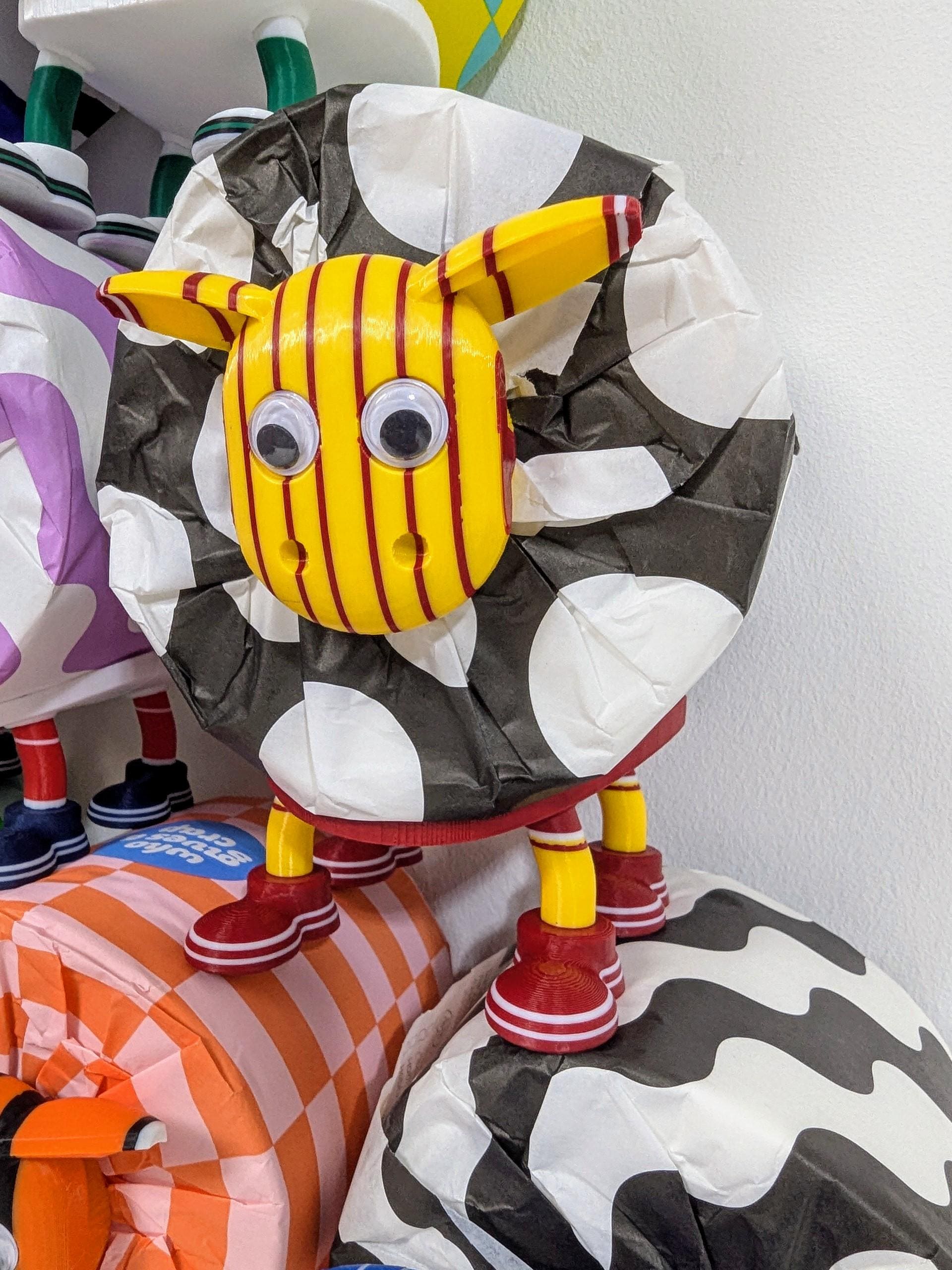 Motherwell Scottish Premier Sheep toilet roll holder. 2025 Home shirts with the steelmens customised football boots.