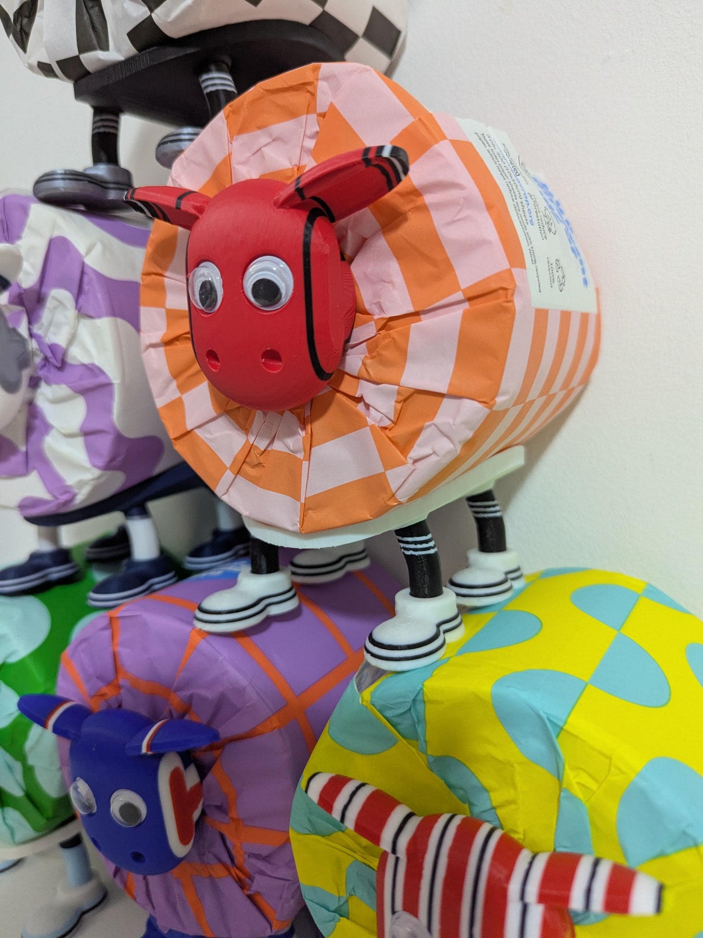 Manchester Utd Premier Sheep 2025 spare toilet roll holder or tissue dispenser cwith customised choice of Man united football boots.