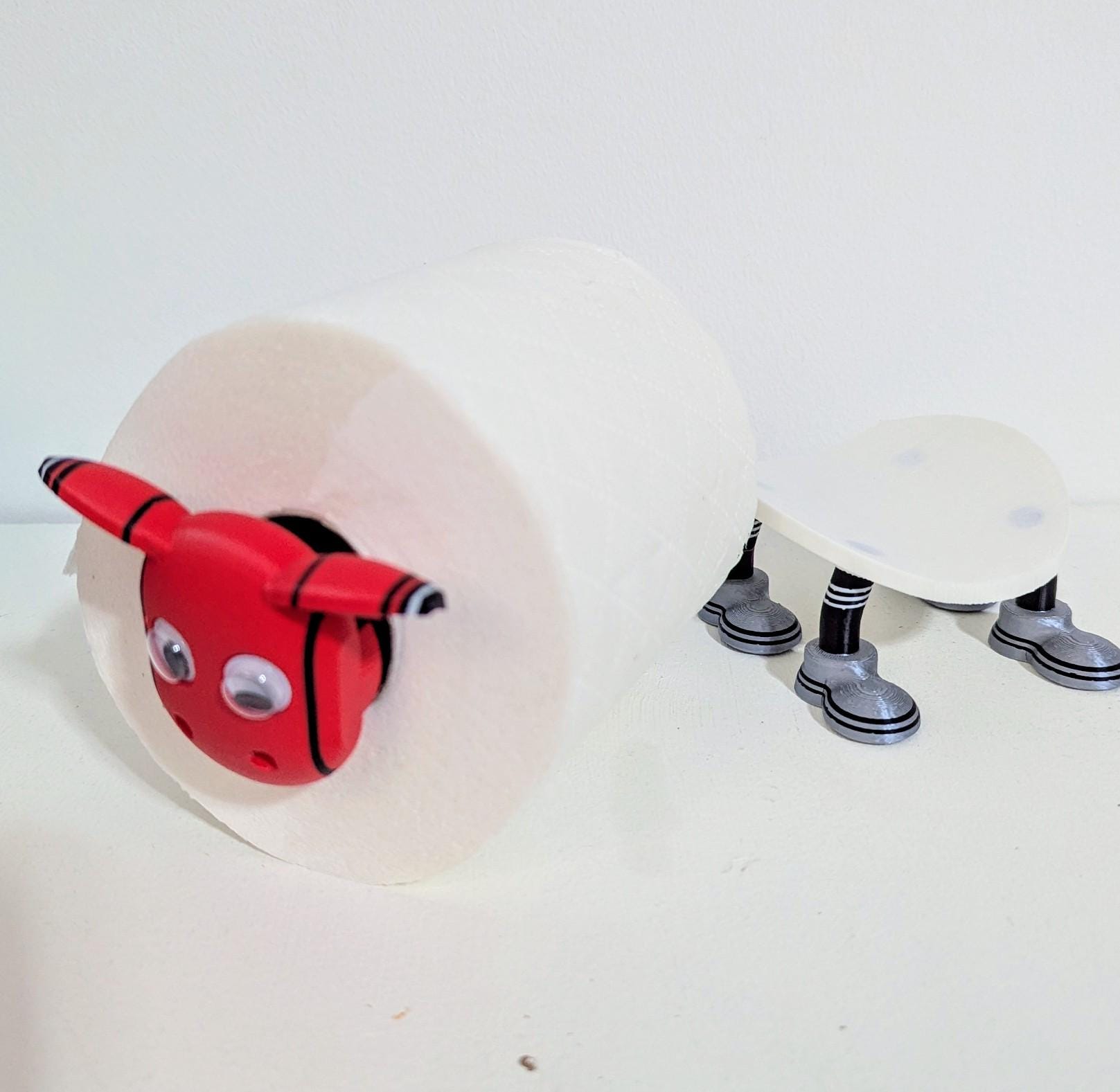 Manchester Utd Premier Sheep 2025 spare toilet roll holder or tissue dispenser cwith customised choice of Man united football boots.