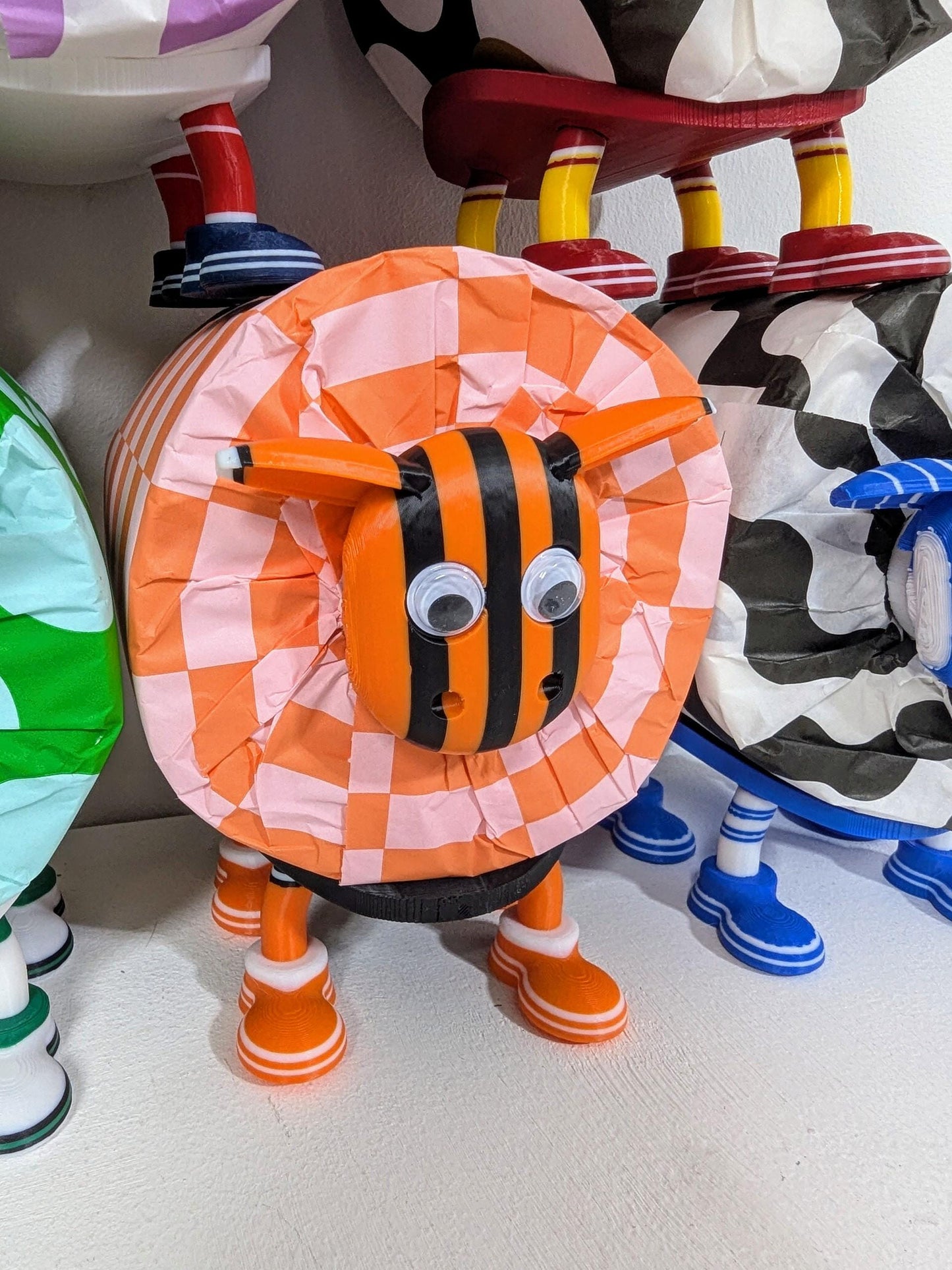 Dundee United Scottish Premier Sheep toilet roll holder. 2025 Home shirts with the Arabs customised football boots.