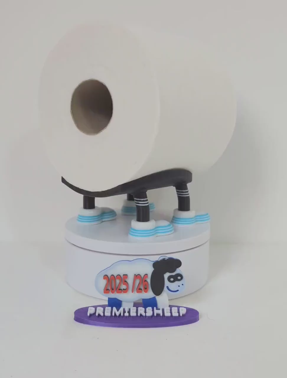 Premiersheep Newcastle United Toilet roll holder featuring the "Shepherds Check" and "Greggs blue" trim for the 2025/26 season Universal fit